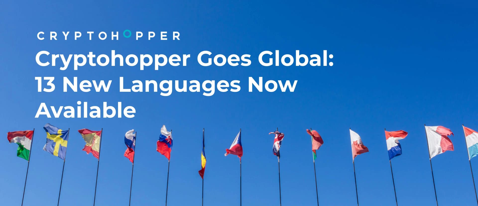 Multiple international flags waving against a blue sky with white text overlay reading "Cryptohopper Goes Global: 13 New Languages Now Available" and the Cryptohopper logo