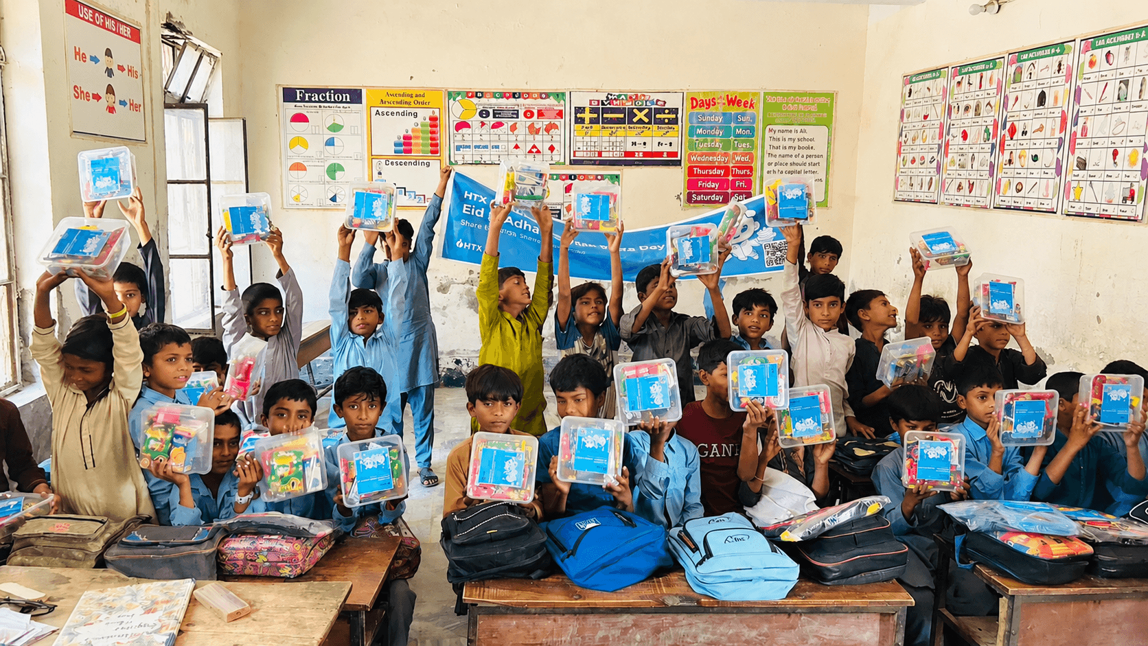 HTX Charity in Action: Delivering Warmth and Care to Children in Pakistan on Bitcoin Pizza Day